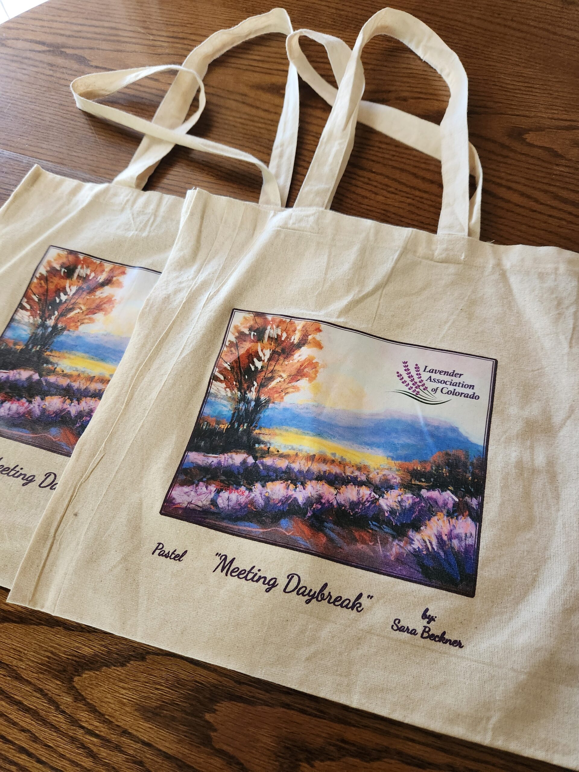 Tote bag featuring 2023 Annual Colorado Lavender Festival Artwork by Sara Beckner Lavender Association of Colorado